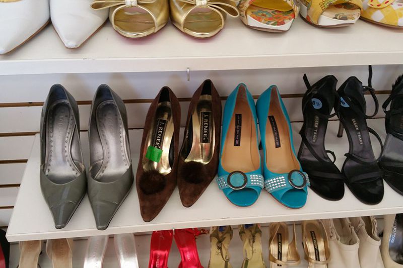 Shelves of stylish high heeled shoes, courtesy of Bargain Hunters Thrift Store