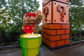 An installation depicting the video-game character Mario outside a Nintendo store in Tokyo. 