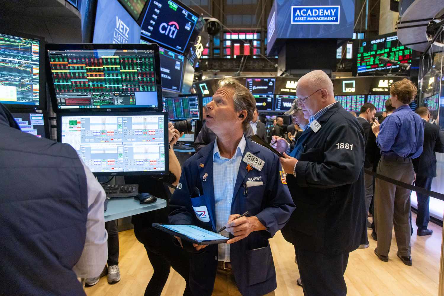 Traders work on the floor of the New York Stock Exchange 