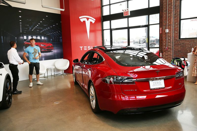 A Tesla Model S in a Tesla showroom.