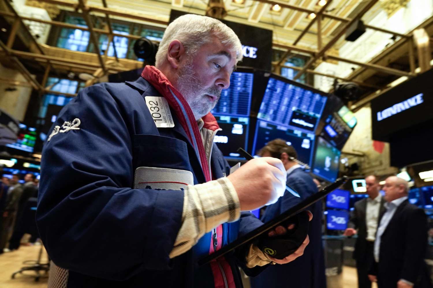 Traders work on the floor of the New York Stock Exchange 