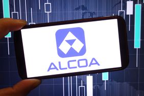 The purple Alcoa logo is seen on a phone screen in front of a blue and white background.