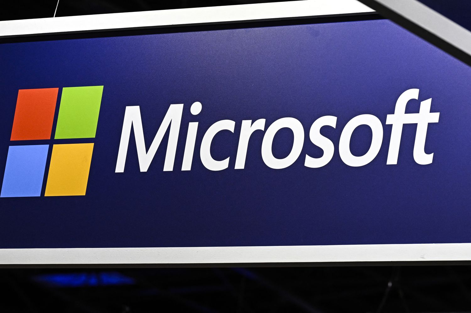 The Microsoft logo on display at an industry event.