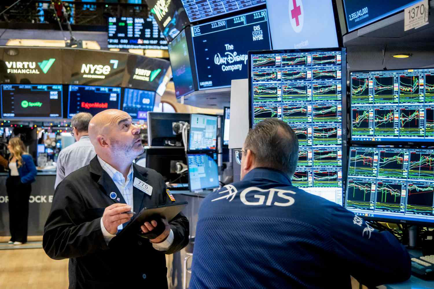 Traders work on the floor of the New York Stock Exchange