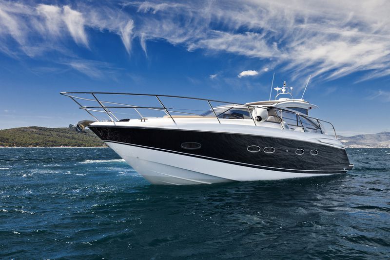 A low angle view of a fast yacht cruising.