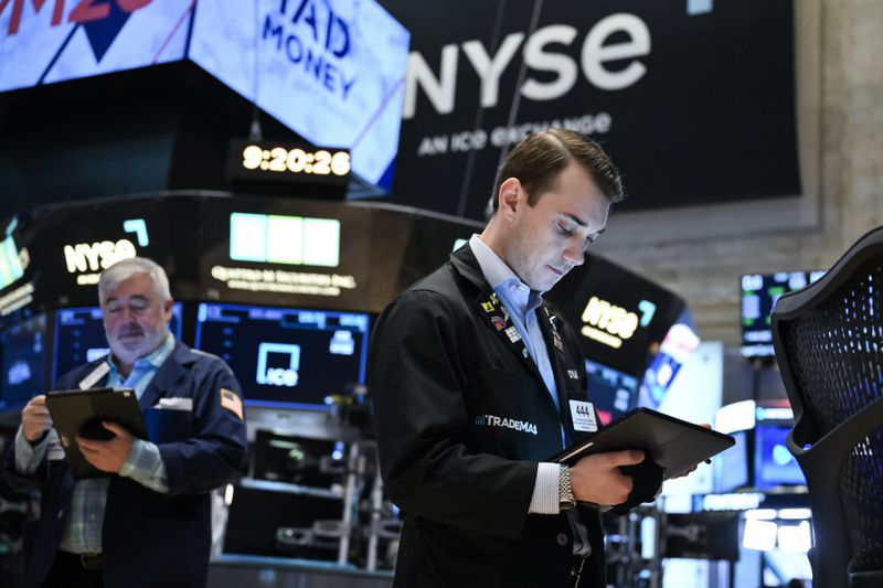 Traders work the floor of the New York Stock Exchange on April 29, 2025. 