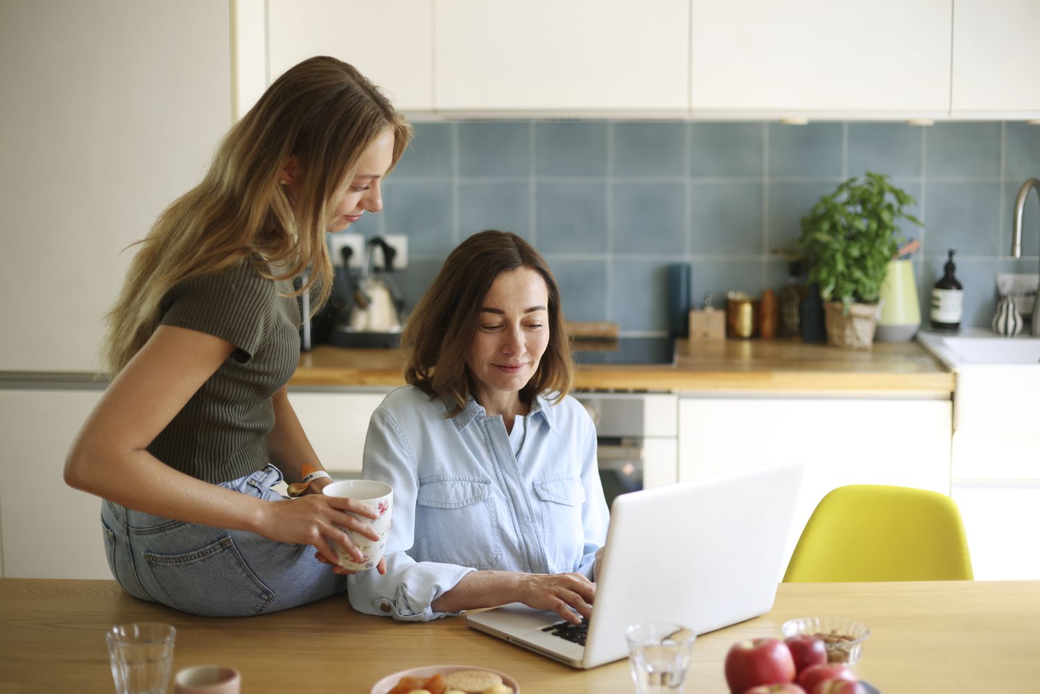 Mom and daughter considering using a home equity loan to pay for college.