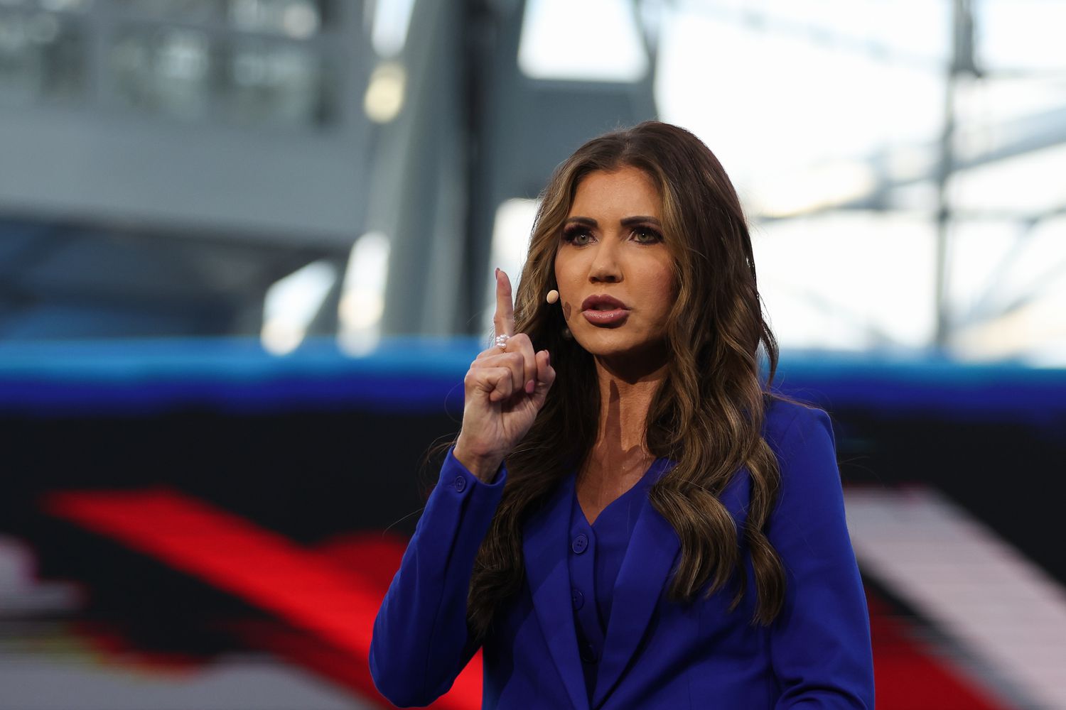 U.S. Secretary of Homeland Security Kristi Noem speaks in Poland in May. 