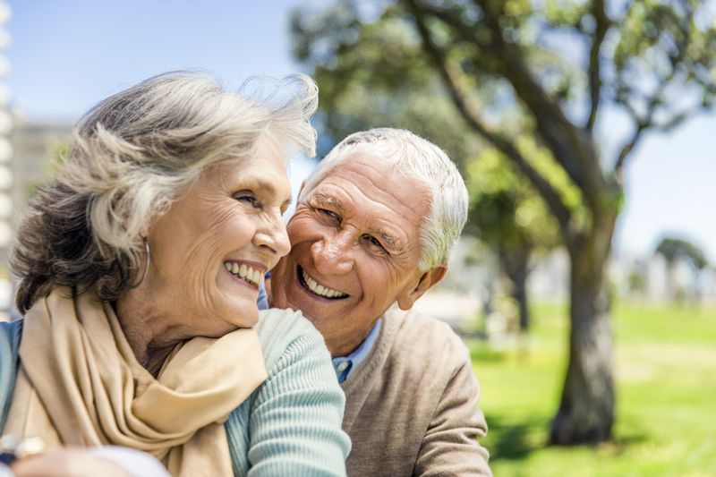 Happy senior couple at park