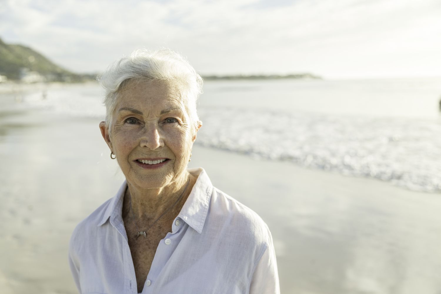 Short-haired woman at the beach