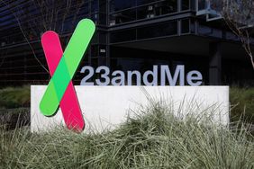 The green and red 23andMe logo is seen on a sign outside the company's office building.