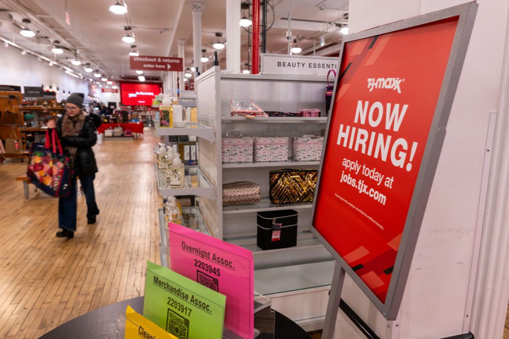  A 'now hiring' sign is displayed in a retail store in Manhattan on January 05, 2024 in New York City.
