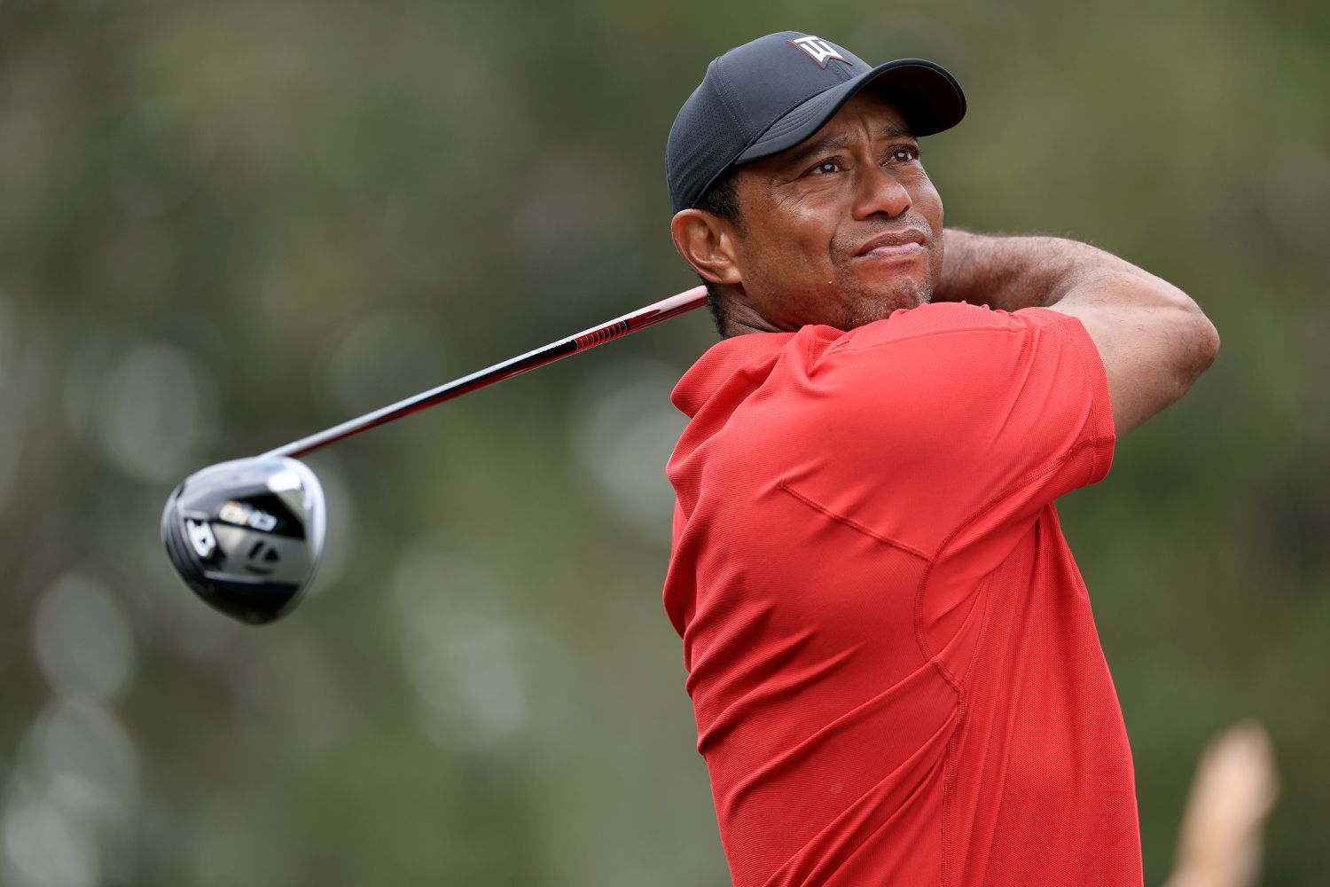 Tiger Woods playing golf in the PNC Championship in Orlando, Florida, Dec. 17, 2023