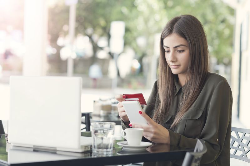Girl Looking at Bank Information on Phone