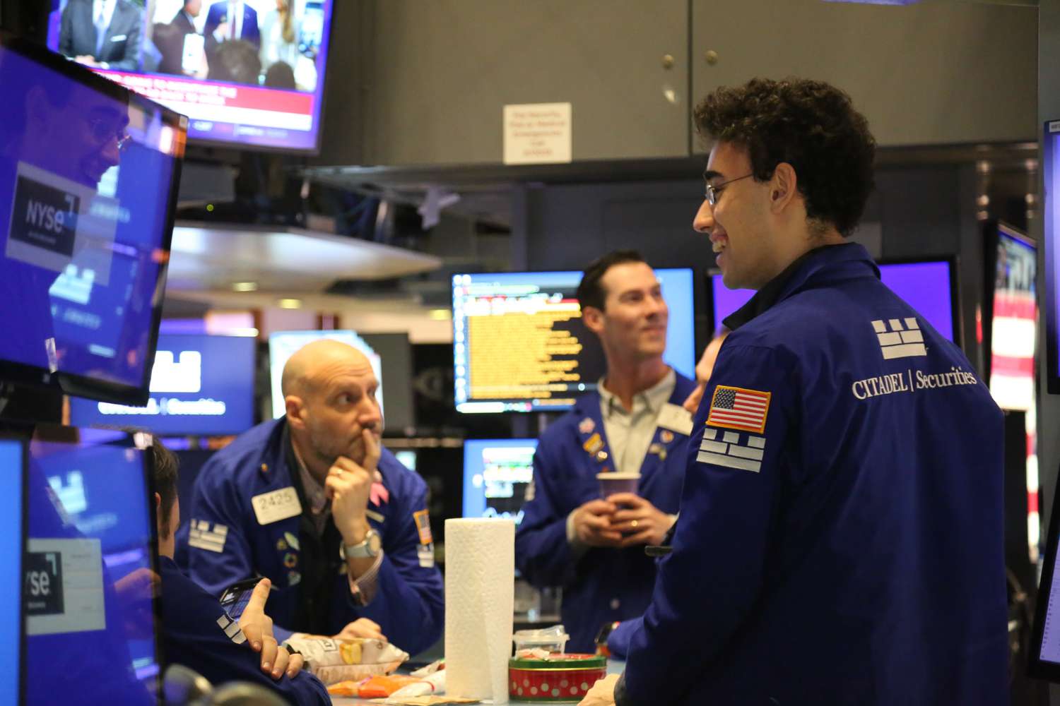 Traders work on the floor of the New York Stock Exchange
