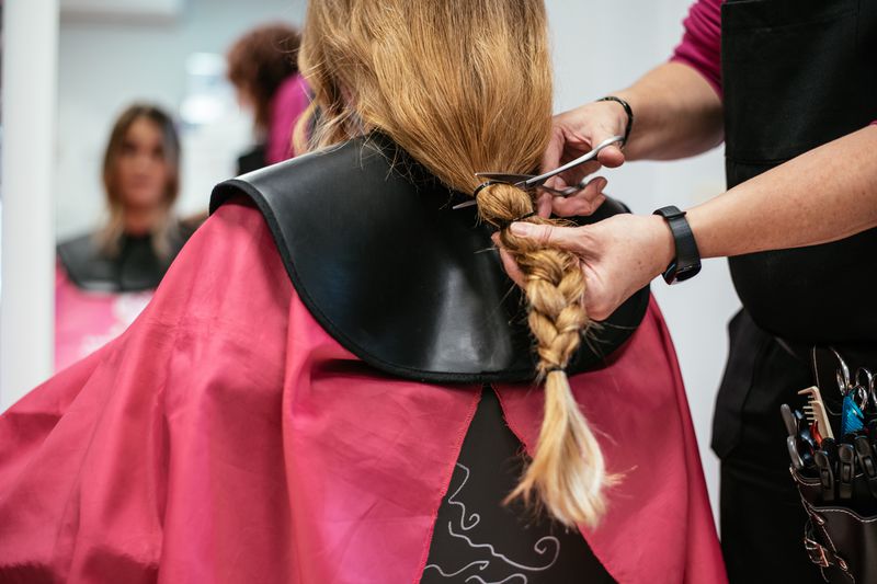 Woman's braid is cut off at salon