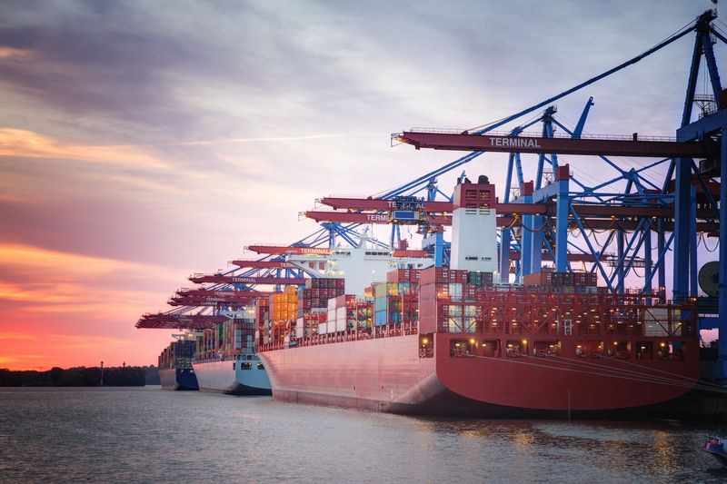 A container ship in the evening.