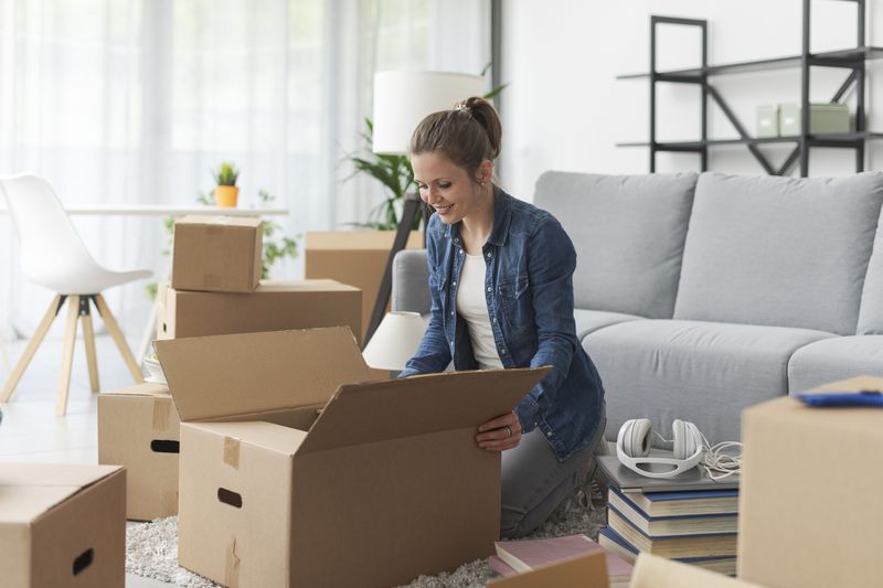 Woman unpacking boxes