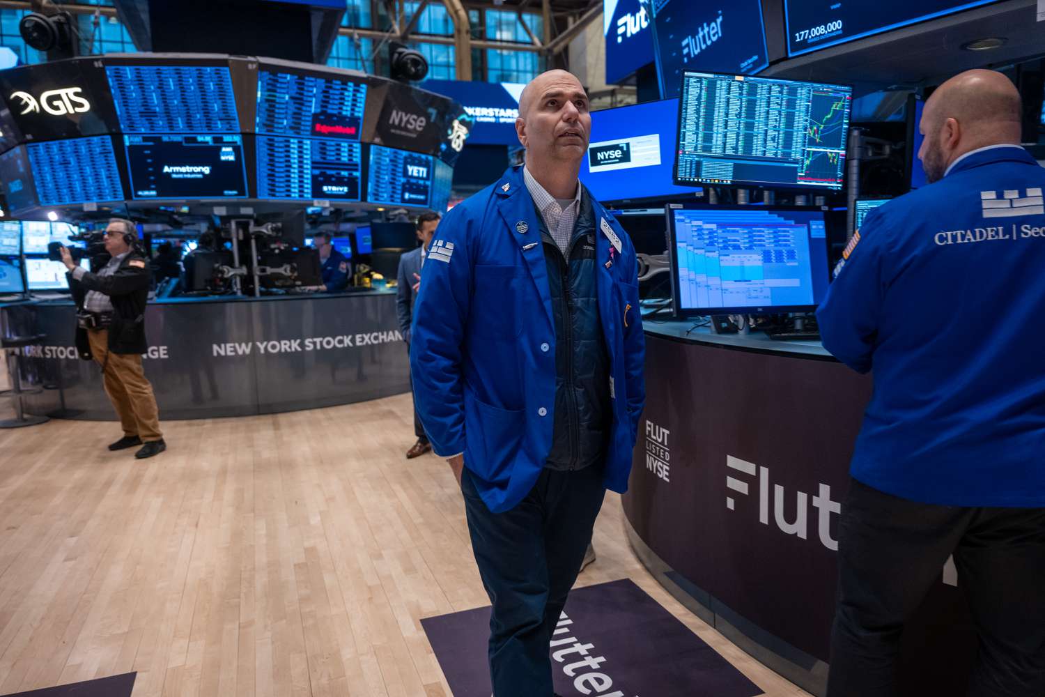 Traders work on the floor of the New York Stock Exchange (NYSE) on January 29, 2024.