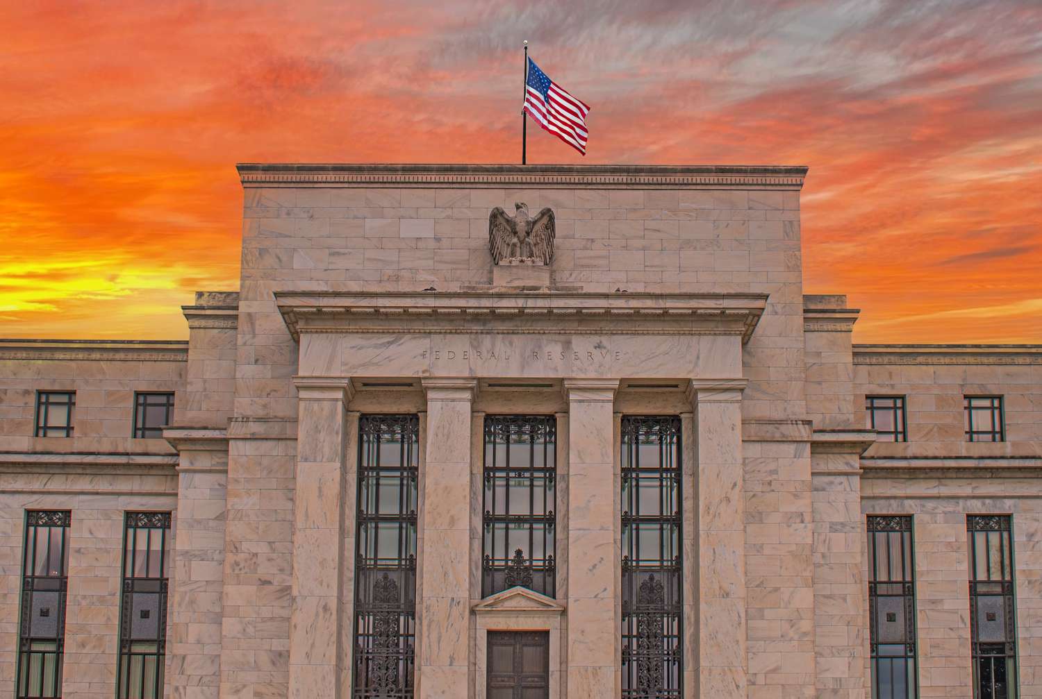 The Federal Reserve building at sunset
