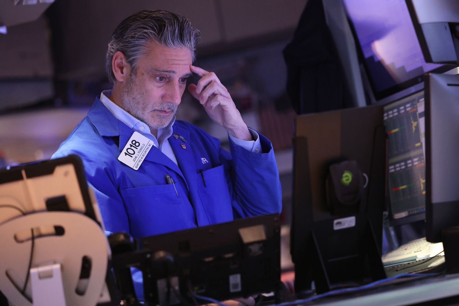 Traders work on the floor of the New York Stock Exchange.