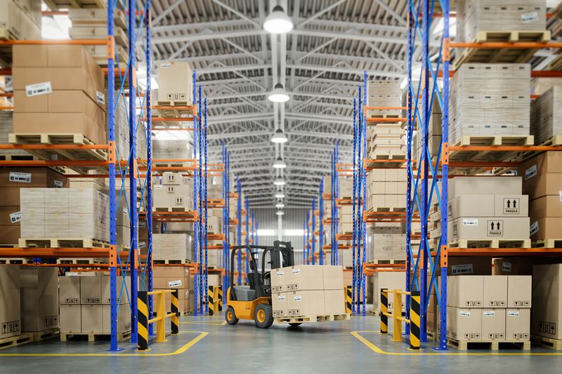Forklift Truck in Warehouse or Storage and Shelves With Cardboard Boxes