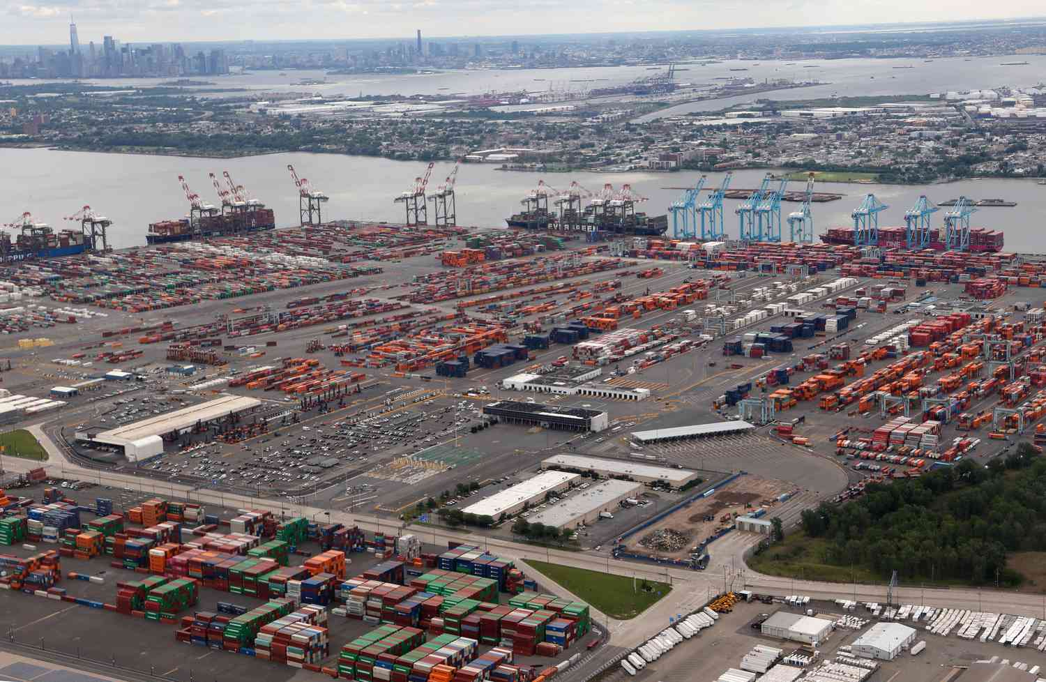 Cargo ships are unloaded at the Maher Container Terminal and APM Terminal on New jersey's Newark Bay on June 1, 2025.