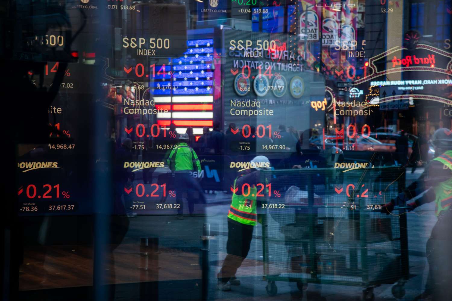Stock market information at the Nasdaq MarketSite in New York, US, on Thursday, Jan. 11, 2024.