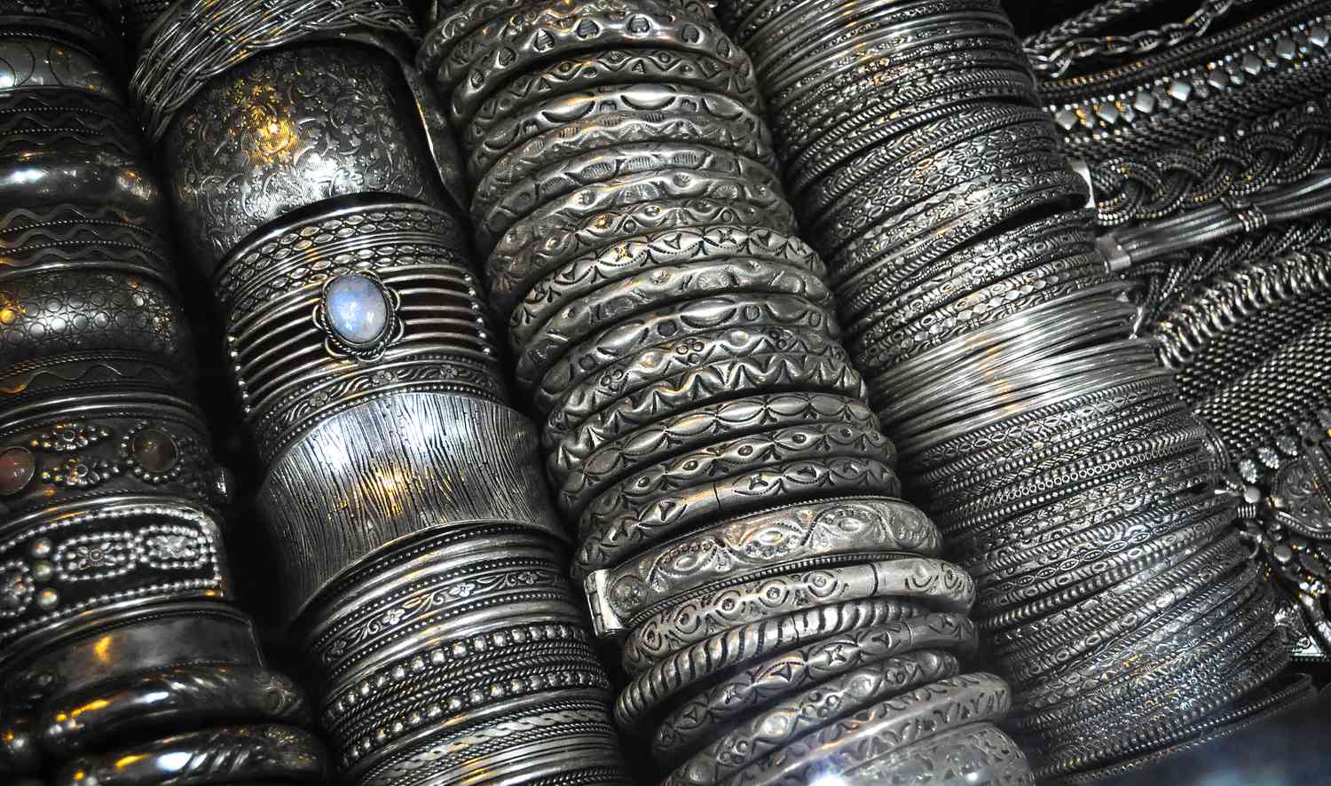 rows of silver bangles
