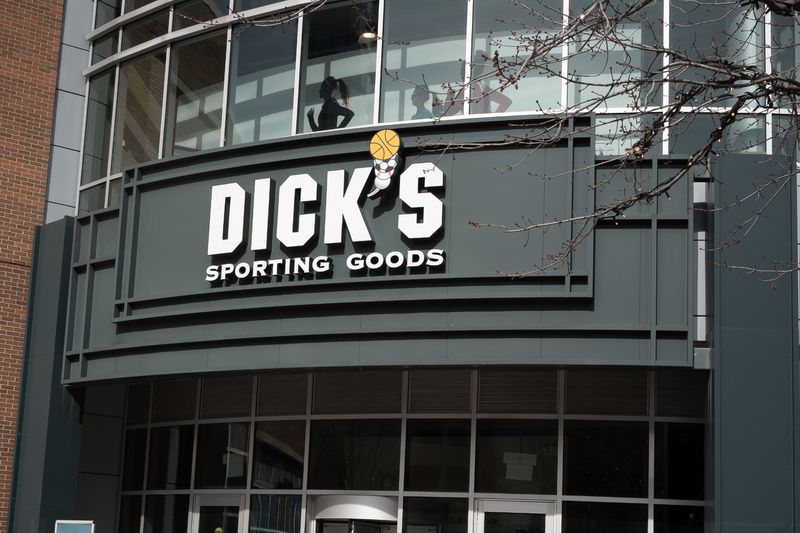 The Dick's Sporting Goods logo is seen above the entrance to a store.