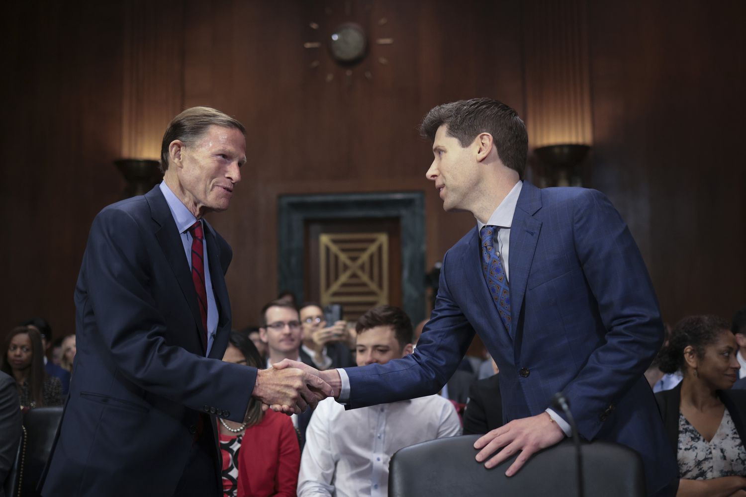 Samuel Altman, CEO of OpenAI, greets committee chairman Sen. Richard Blumenthal (D-CT) while arriving for testimony before the Senate Judiciary Subcommittee on Privacy, Technology, and the Law May 16, 2023 in Washington, DC.