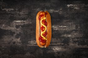 Overhead Shot of Hot Dog on Rustic Table