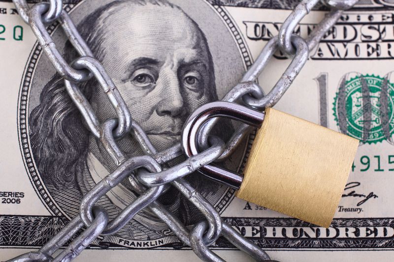 Padlock on Hundred Dollar Bill