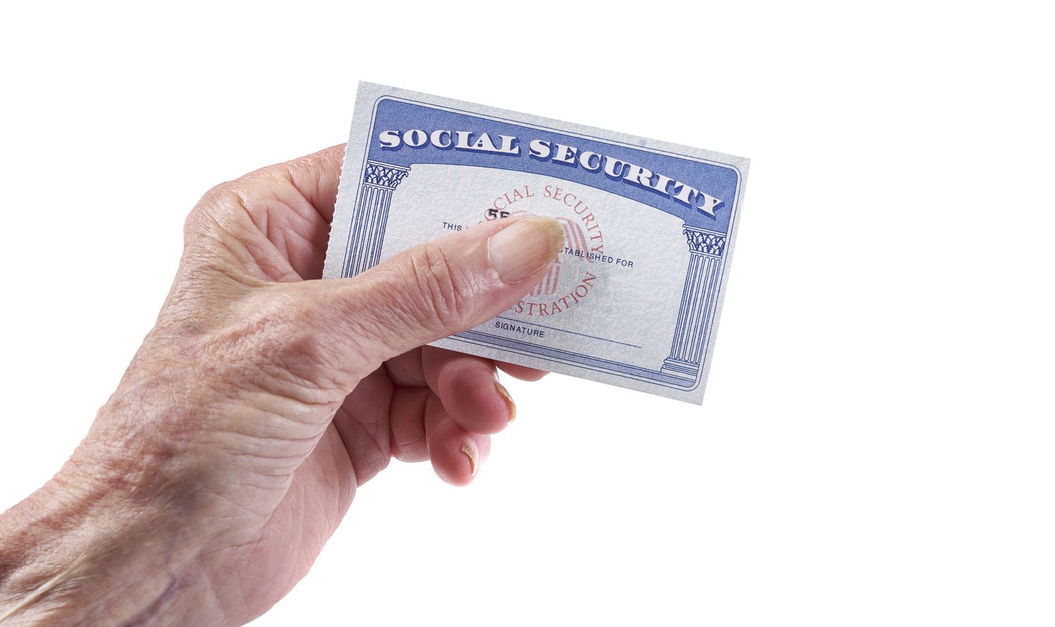 Woman’s hand holding Social Security card