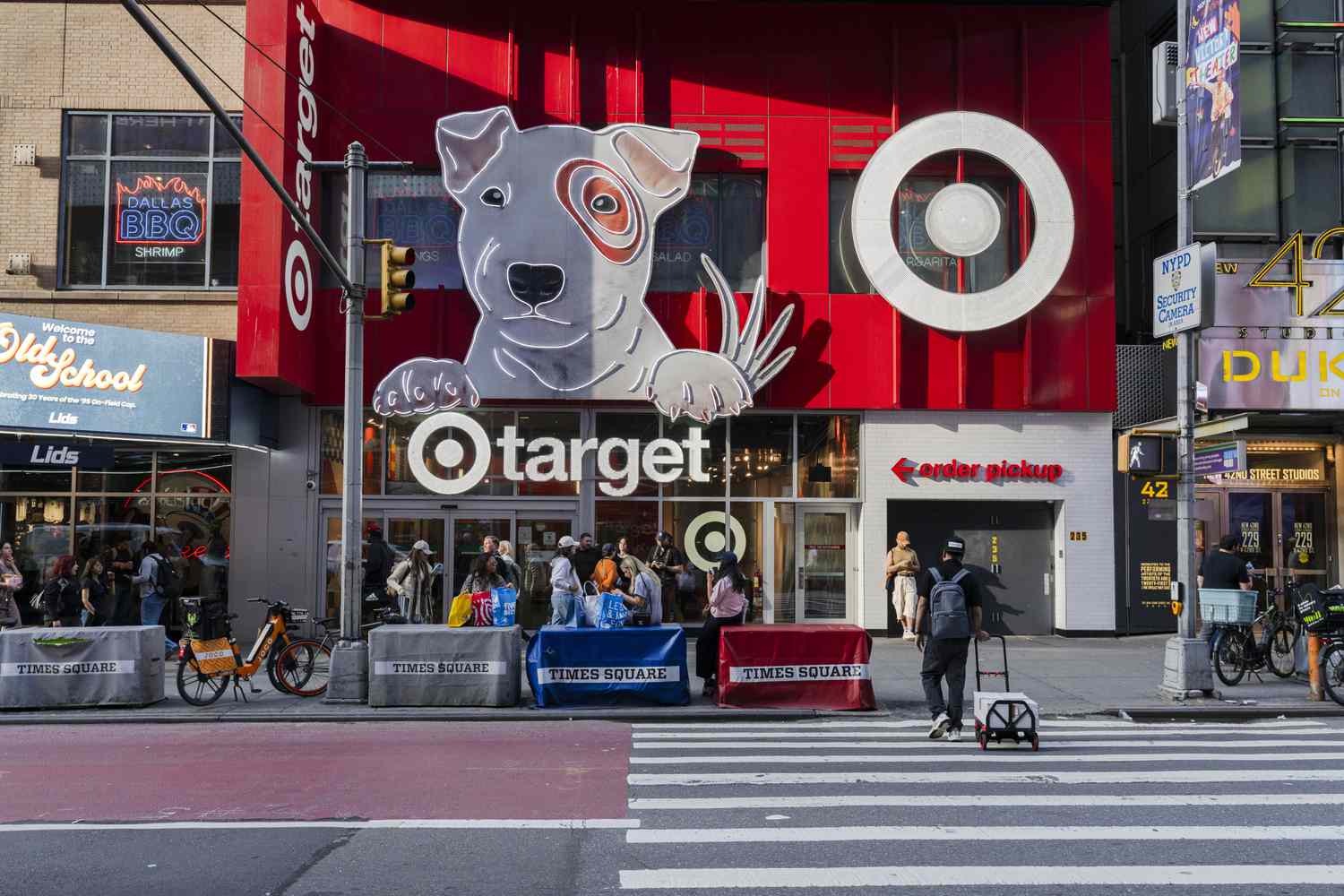 People walk in front of a Target store in Times Square in New York City