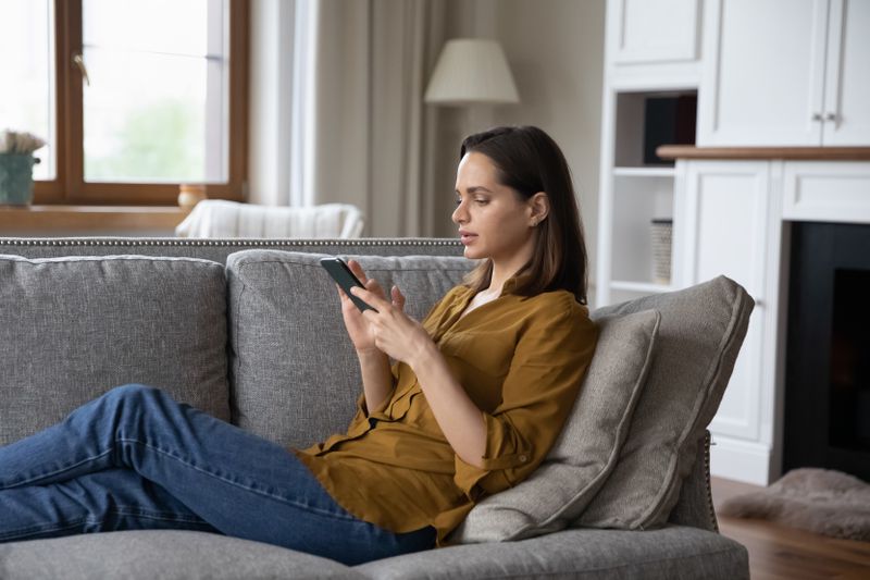 Woman searching for the best real estate apps 
