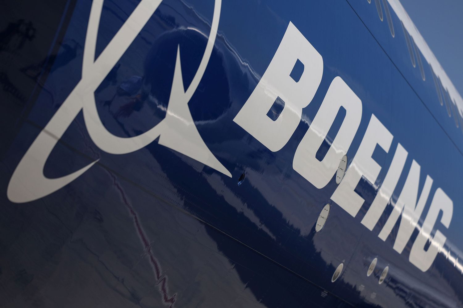 Boeing logo on the body of a Boeing 777-9 passenger jet in November 2023
