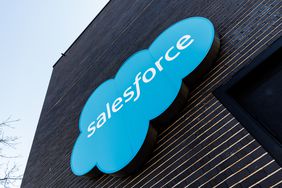 The blue Salesforce logo is seen on the side of a building.