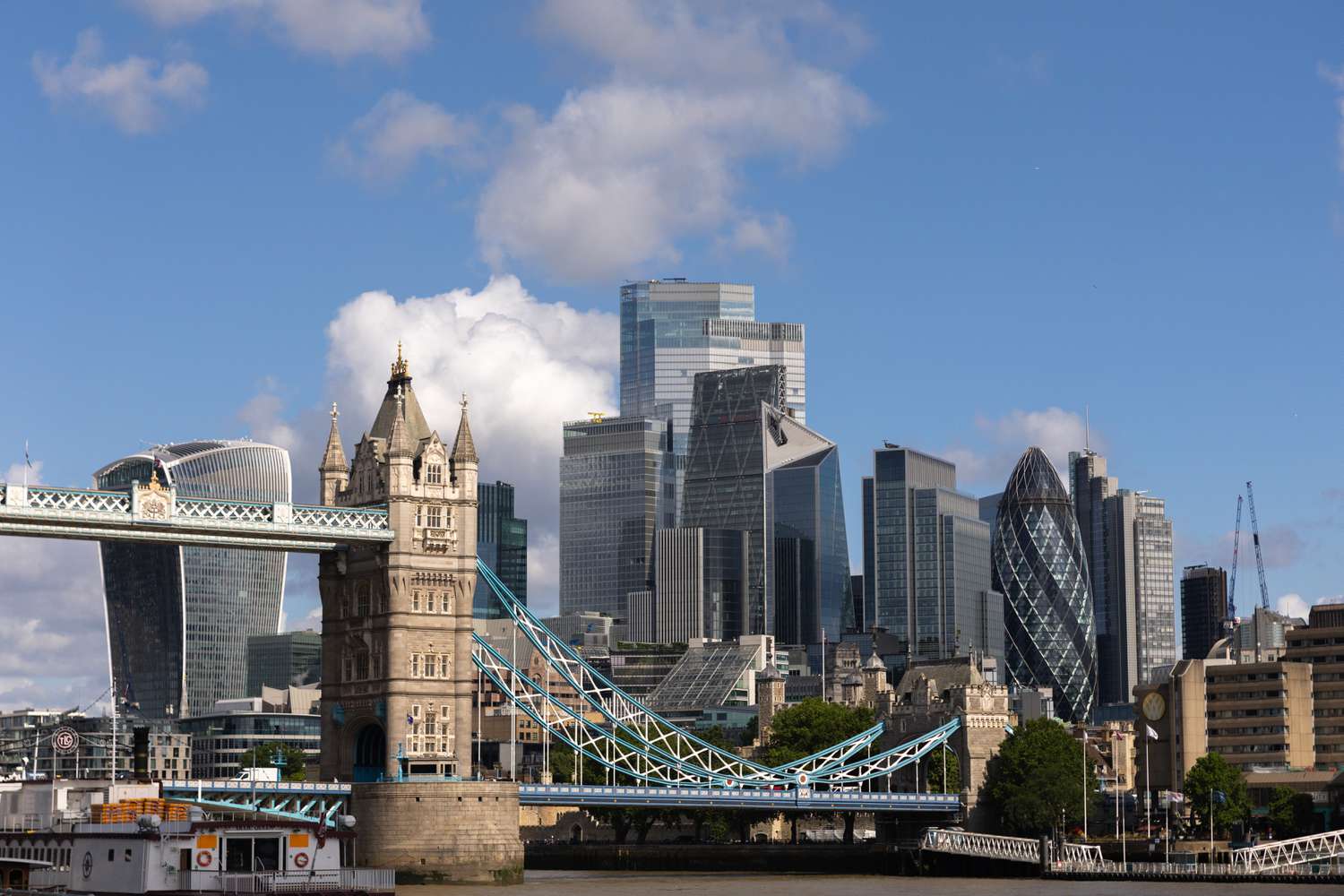 Skyscrapers and commercial buildings, beyond Tower Bridge, in the City of London, UK, on Monday, June 2, 2025. 