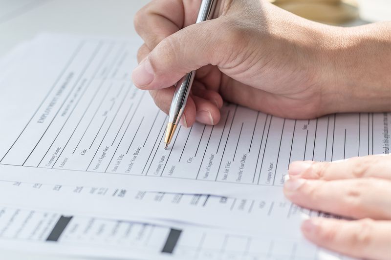Person filling in a form
