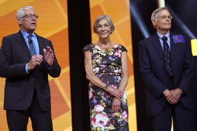 Members of the Walton family (L-R) Rob, Alice and Jim speak during the annual Walmart shareholders meeting event