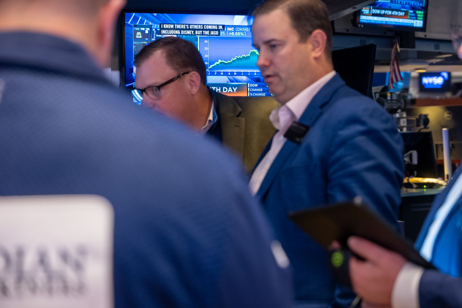 Traders work on the floor of the New York Stock Exchange (NYSE).