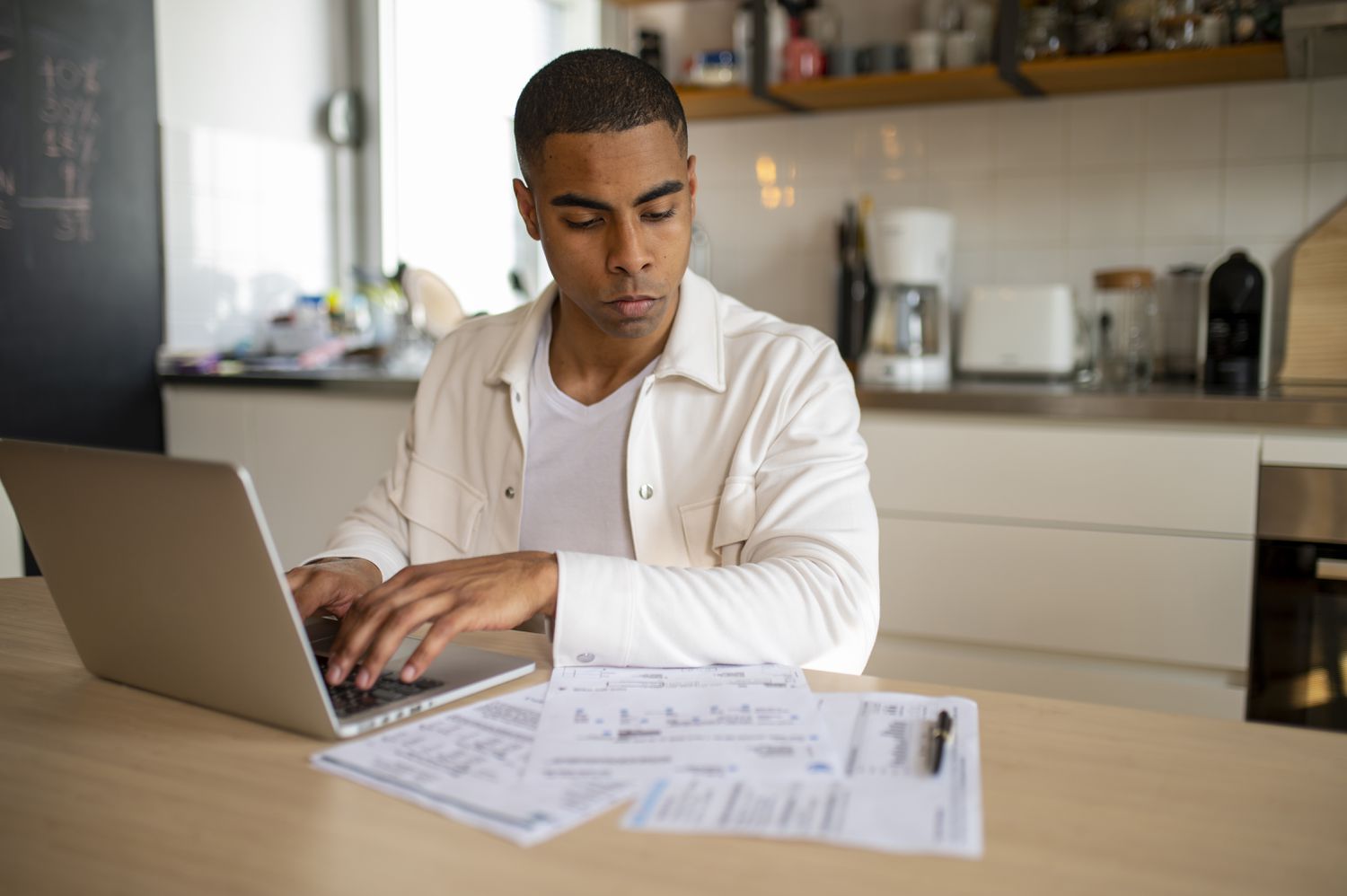 Young man working on a computer.
