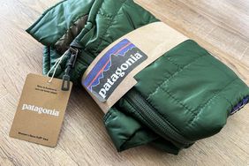The Patagonia Women's Nano Puff Vest folded inside branded packaging