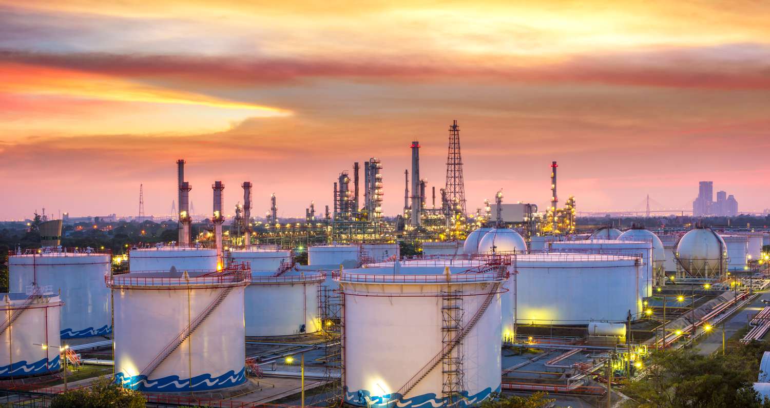 Oil refinery at sunset