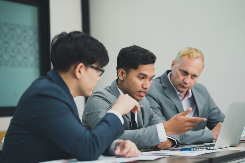 Asset managers selecting investment options for a structured investment vehicle.