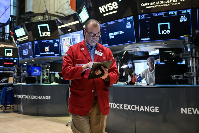A trader works on the floor at the New York Stock Exchange