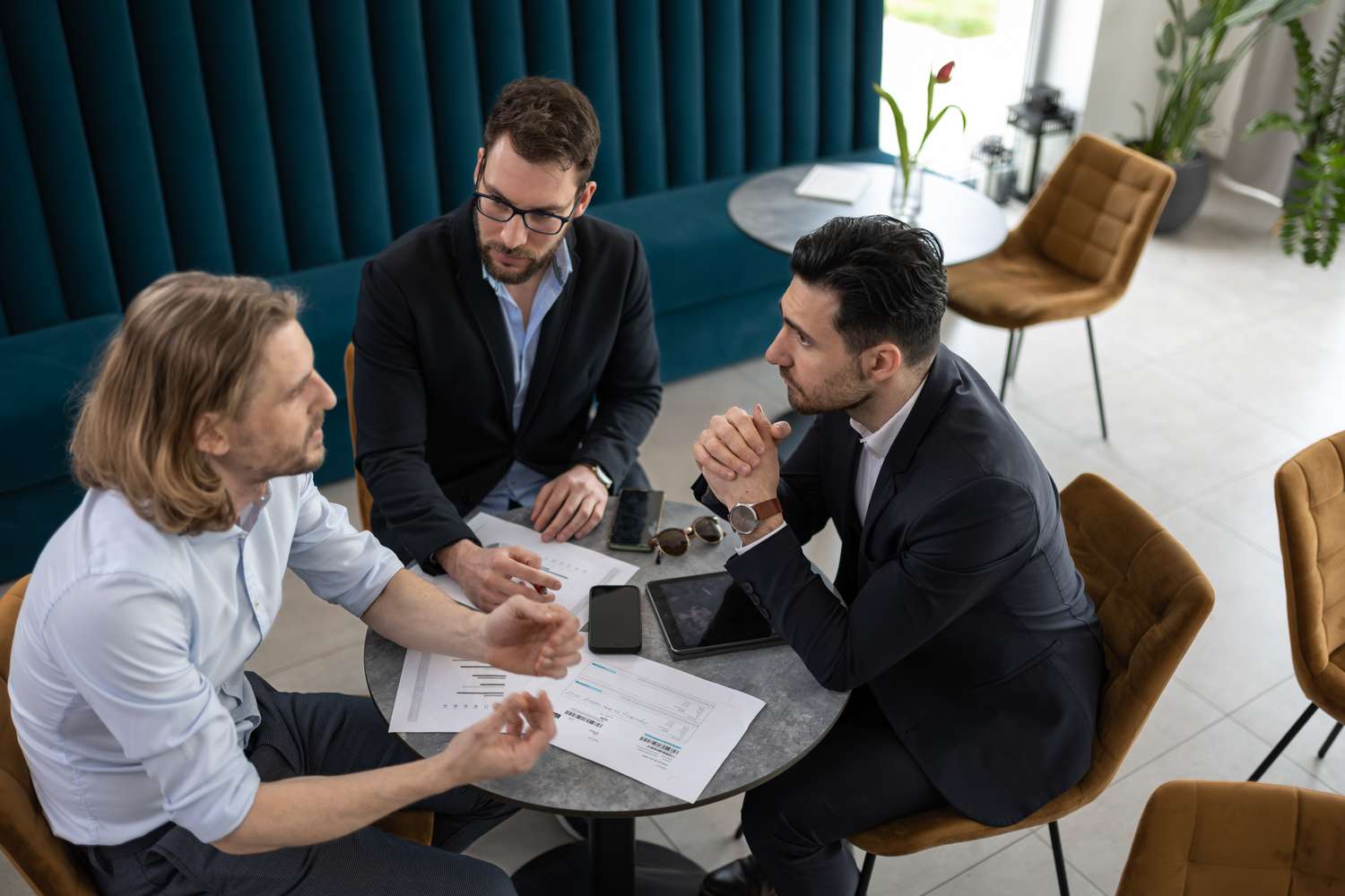 Businesspeople discussing reinsurance options
