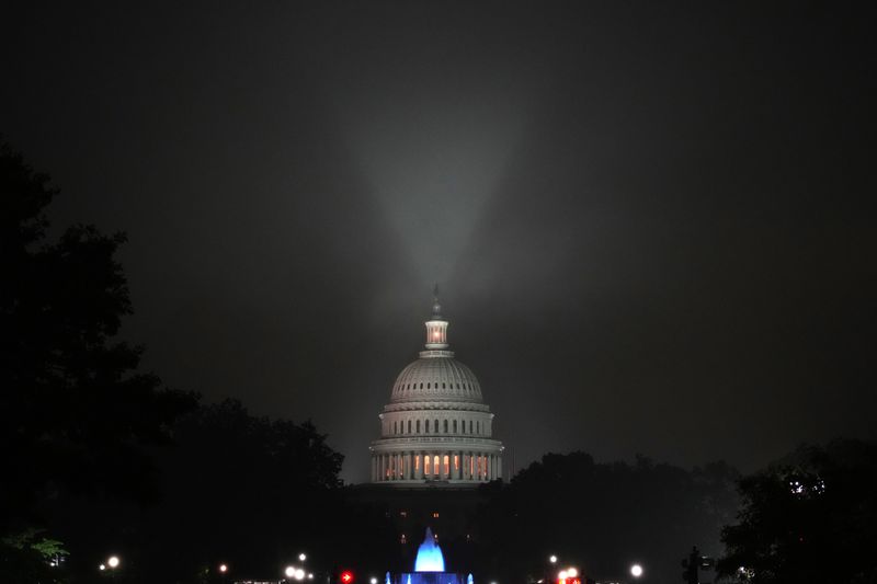 The U.S. Capitol is illuminated at night in Washington, D.C.