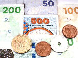 Norwegian kroner in coins and banknotes in denominations of 50, 100, 200, and 500